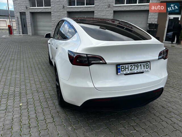 Белый Тесла Model Y, объемом двигателя 0 л и пробегом 98 тыс. км за 28000 $, фото 6 на Automoto.ua