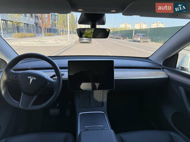Білий Тесла Model Y, об'ємом двигуна 0 л та пробігом 55 тис. км за 33014 $, фото 24 на Automoto.ua