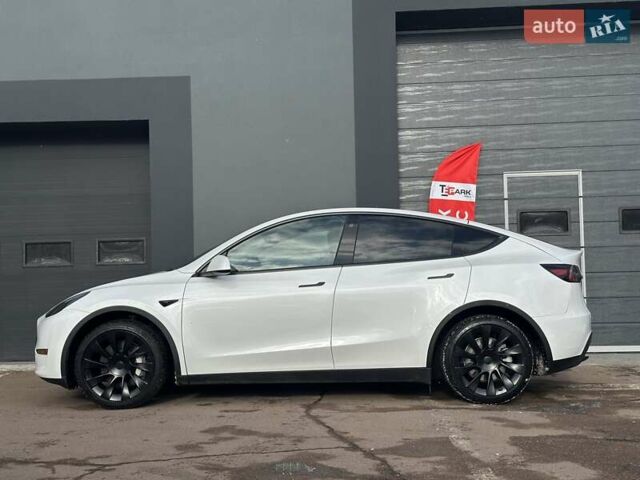 Білий Тесла Model Y, об'ємом двигуна 0 л та пробігом 36 тис. км за 30999 $, фото 4 на Automoto.ua