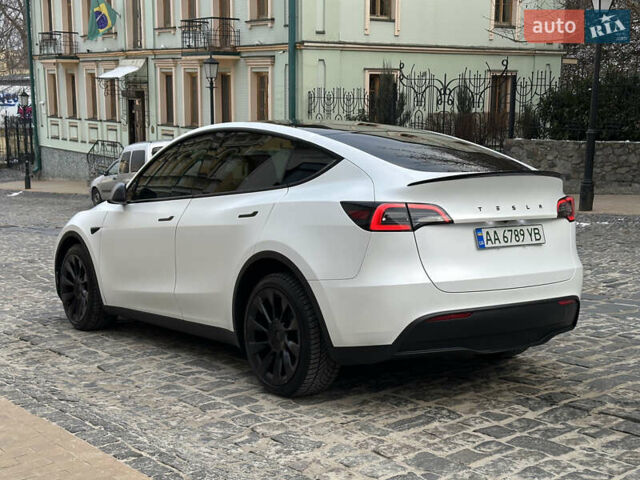 Білий Тесла Model Y, об'ємом двигуна 0 л та пробігом 20 тис. км за 29999 $, фото 2 на Automoto.ua