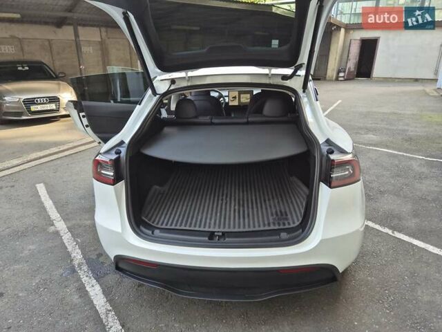 Білий Тесла Model Y, об'ємом двигуна 0 л та пробігом 67 тис. км за 25500 $, фото 13 на Automoto.ua