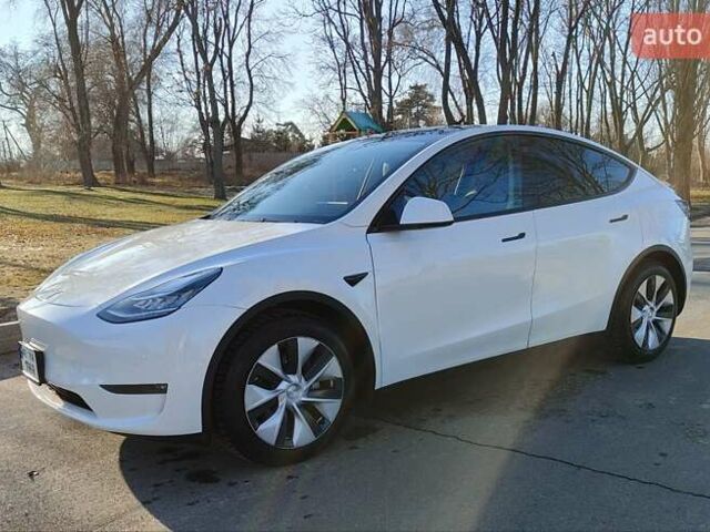 Белый Тесла Model Y, объемом двигателя 0 л и пробегом 100 тыс. км за 24444 $, фото 1 на Automoto.ua
