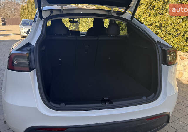 Белый Тесла Model Y, объемом двигателя 0 л и пробегом 28 тыс. км за 27600 $, фото 13 на Automoto.ua