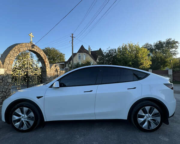 Білий Тесла Model Y, об'ємом двигуна 0 л та пробігом 81 тис. км за 31900 $, фото 11 на Automoto.ua