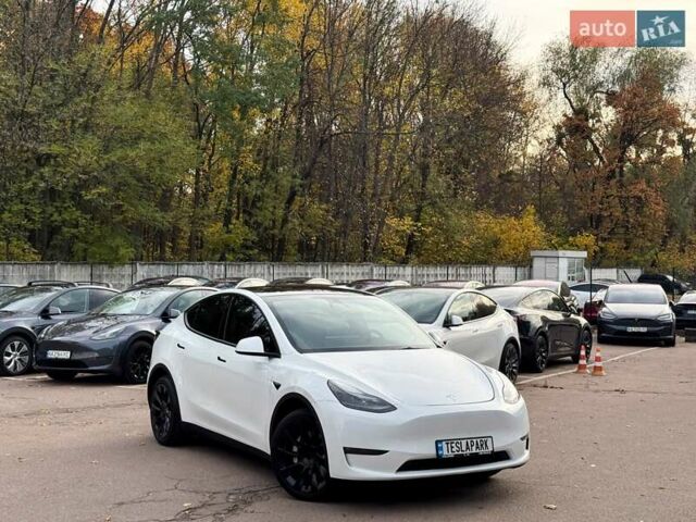 Белый Тесла Model Y, объемом двигателя 0 л и пробегом 89 тыс. км за 30999 $, фото 1 на Automoto.ua