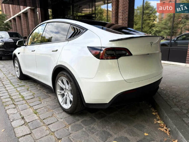 Белый Тесла Model Y, объемом двигателя 0 л и пробегом 49 тыс. км за 23000 $, фото 2 на Automoto.ua