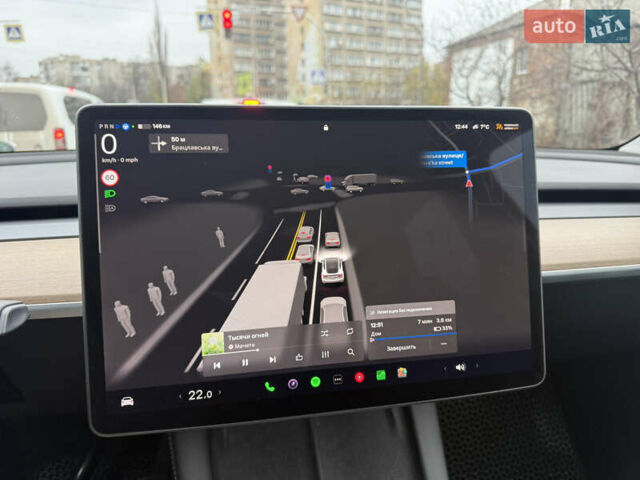 Белый Тесла Model Y, объемом двигателя 0 л и пробегом 53 тыс. км за 28800 $, фото 29 на Automoto.ua