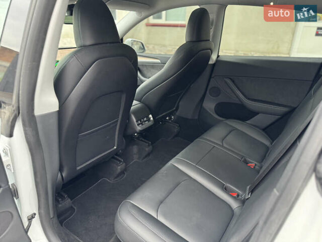 Білий Тесла Model Y, об'ємом двигуна 0 л та пробігом 37 тис. км за 25500 $, фото 33 на Automoto.ua