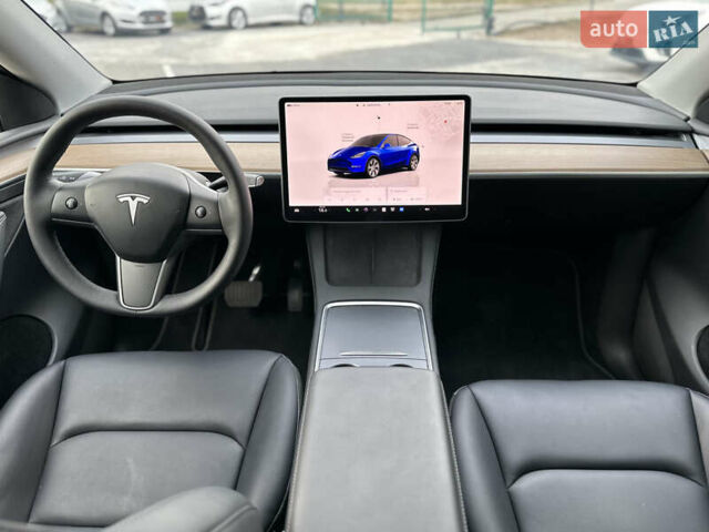Білий Тесла Model Y, об'ємом двигуна 0 л та пробігом 47 тис. км за 27600 $, фото 36 на Automoto.ua