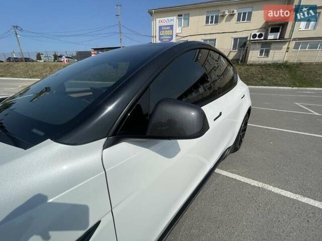Білий Тесла Model Y, об'ємом двигуна 0 л та пробігом 75 тис. км за 33500 $, фото 31 на Automoto.ua