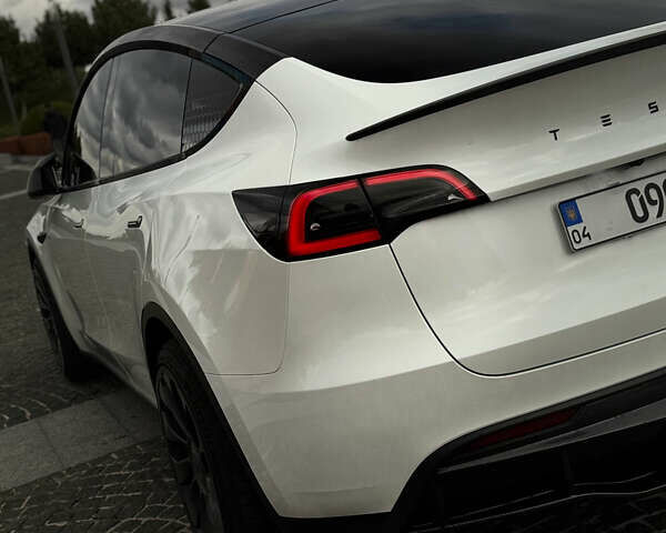 Білий Тесла Model Y, об'ємом двигуна 0 л та пробігом 52 тис. км за 32000 $, фото 12 на Automoto.ua