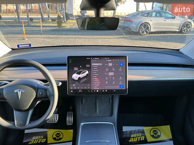 Білий Тесла Model Y, об'ємом двигуна 0 л та пробігом 73 тис. км за 27750 $, фото 14 на Automoto.ua