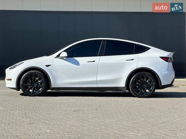 Білий Тесла Model Y, об'ємом двигуна 0 л та пробігом 52 тис. км за 24900 $, фото 6 на Automoto.ua