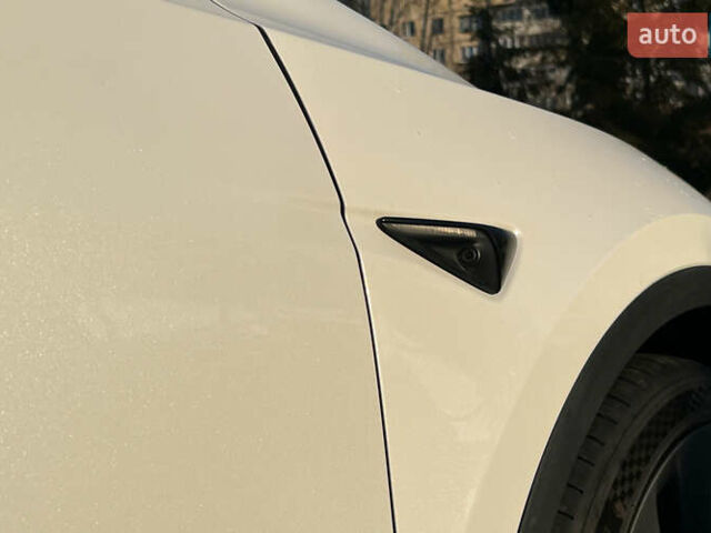Білий Тесла Model Y, об'ємом двигуна 0 л та пробігом 73 тис. км за 27750 $, фото 21 на Automoto.ua