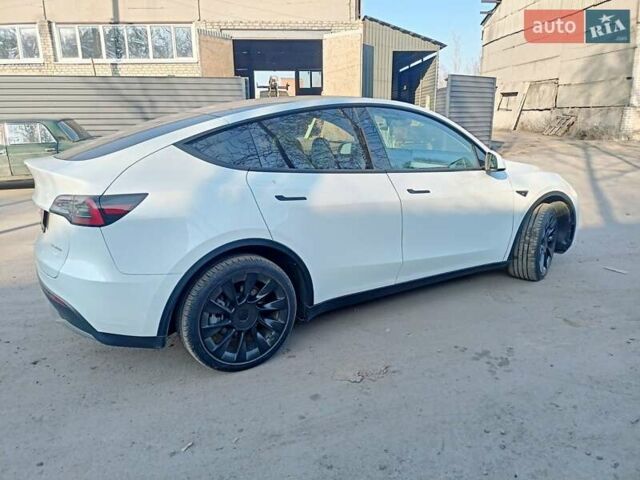 Белый Тесла Model Y, объемом двигателя 0 л и пробегом 17 тыс. км за 28500 $, фото 2 на Automoto.ua