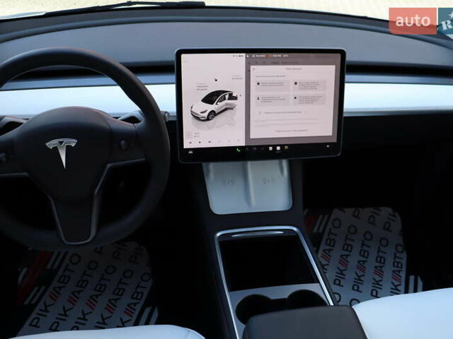Белый Тесла Model Y, объемом двигателя 0 л и пробегом 34 тыс. км за 27400 $, фото 29 на Automoto.ua