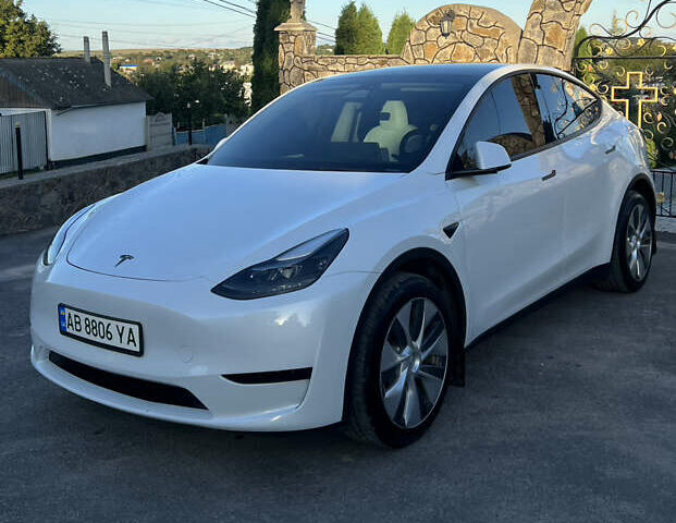 Білий Тесла Model Y, об'ємом двигуна 0 л та пробігом 81 тис. км за 31900 $, фото 1 на Automoto.ua