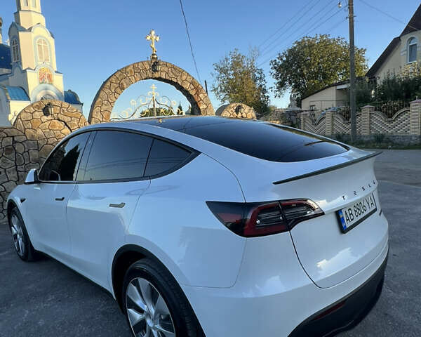 Білий Тесла Model Y, об'ємом двигуна 0 л та пробігом 81 тис. км за 31900 $, фото 14 на Automoto.ua
