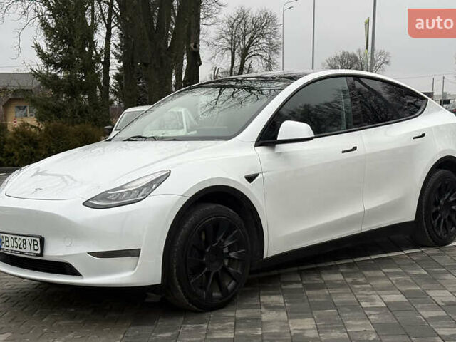 Белый Тесла Model Y, объемом двигателя 0 л и пробегом 53 тыс. км за 28800 $, фото 1 на Automoto.ua
