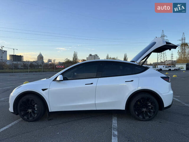 Білий Тесла Model Y, об'ємом двигуна 0 л та пробігом 48 тис. км за 28000 $, фото 4 на Automoto.ua