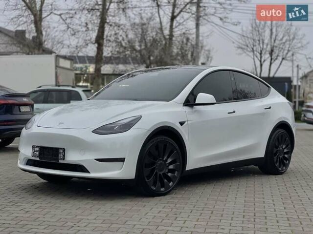 Білий Тесла Model Y, об'ємом двигуна 0 л та пробігом 27 тис. км за 28500 $, фото 2 на Automoto.ua