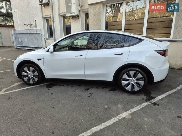 Білий Тесла Model Y, об'ємом двигуна 0 л та пробігом 67 тис. км за 25500 $, фото 2 на Automoto.ua