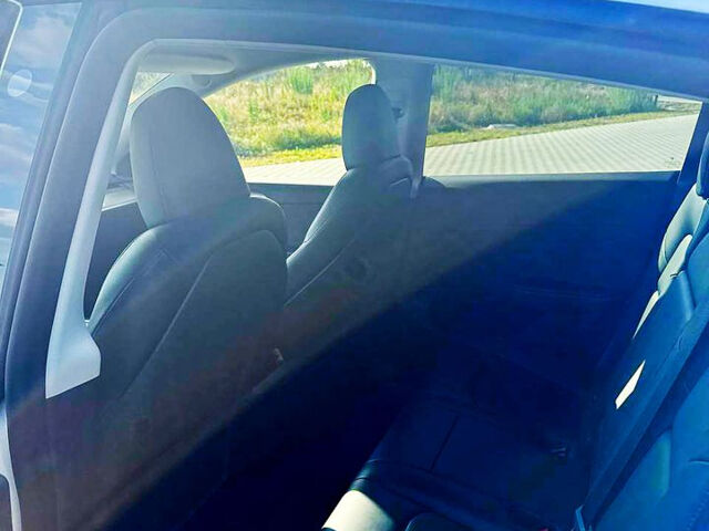 Білий Тесла Model Y, об'ємом двигуна 0 л та пробігом 21 тис. км за 30500 $, фото 8 на Automoto.ua