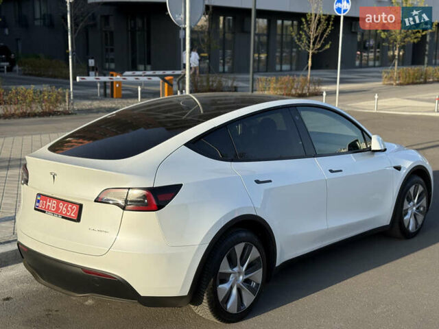Білий Тесла Model Y, об'ємом двигуна 0 л та пробігом 55 тис. км за 33014 $, фото 13 на Automoto.ua