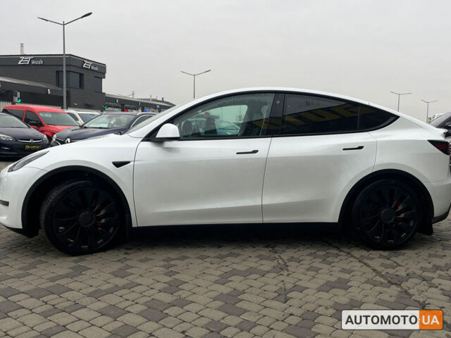 Білий Тесла Model Y, об'ємом двигуна 82 л та пробігом 33 тис. км за 35000 $, фото 3 на Automoto.ua