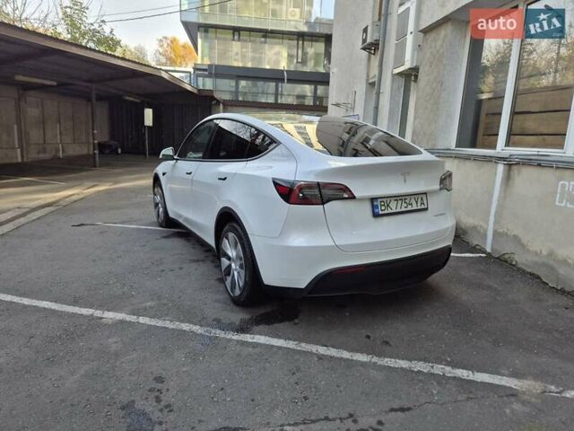 Білий Тесла Model Y, об'ємом двигуна 0 л та пробігом 67 тис. км за 25500 $, фото 9 на Automoto.ua