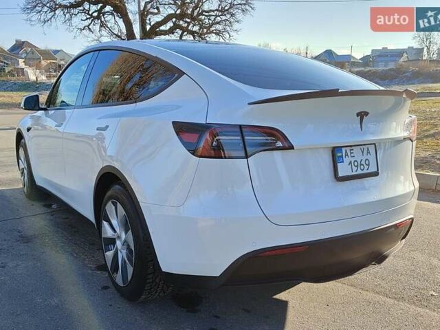 Белый Тесла Model Y, объемом двигателя 0 л и пробегом 100 тыс. км за 24444 $, фото 2 на Automoto.ua