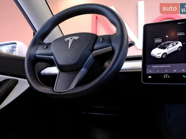Белый Тесла Model Y, объемом двигателя 0 л и пробегом 52 тыс. км за 26900 $, фото 51 на Automoto.ua