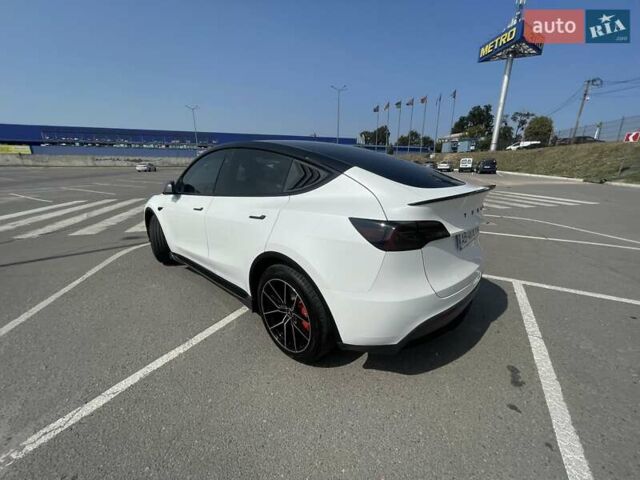 Білий Тесла Model Y, об'ємом двигуна 0 л та пробігом 75 тис. км за 33500 $, фото 33 на Automoto.ua