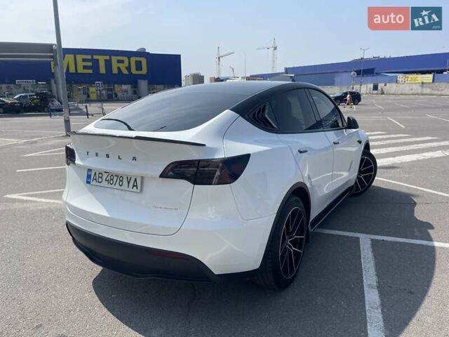 Білий Тесла Model Y, об'ємом двигуна 0 л та пробігом 75 тис. км за 33500 $, фото 37 на Automoto.ua