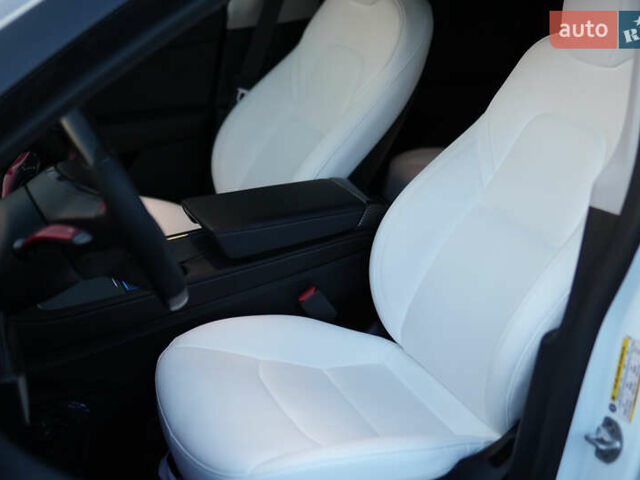 Білий Тесла Model Y, об'ємом двигуна 0 л та пробігом 48 тис. км за 34300 $, фото 24 на Automoto.ua