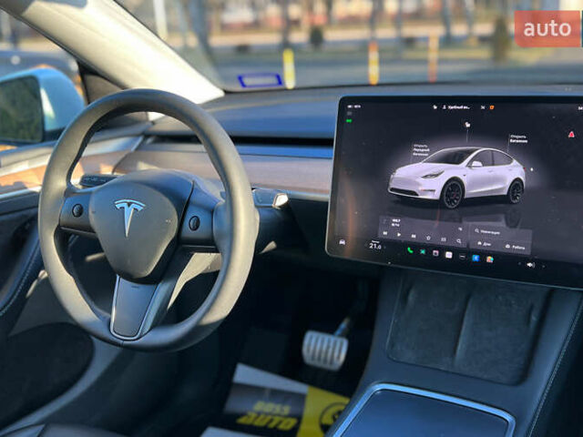 Білий Тесла Model Y, об'ємом двигуна 0 л та пробігом 73 тис. км за 27750 $, фото 18 на Automoto.ua