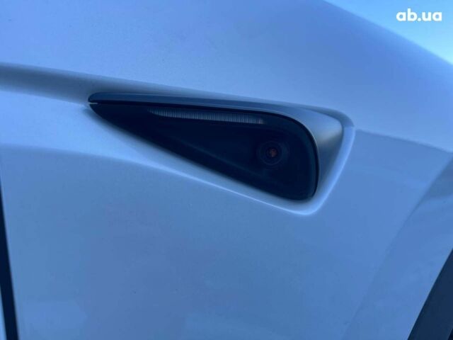 Белый Тесла Model Y, объемом двигателя 0 л и пробегом 13 тыс. км за 33190 $, фото 25 на Automoto.ua