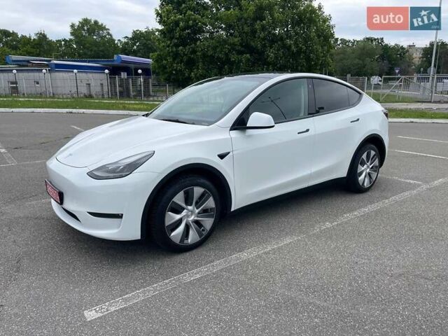 Белый Тесла Model Y, объемом двигателя 0 л и пробегом 56 тыс. км за 31500 $, фото 1 на Automoto.ua