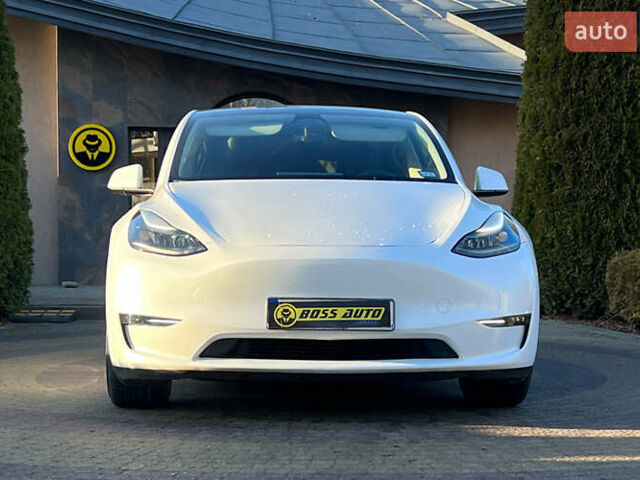 Білий Тесла Model Y, об'ємом двигуна 0 л та пробігом 73 тис. км за 27750 $, фото 1 на Automoto.ua