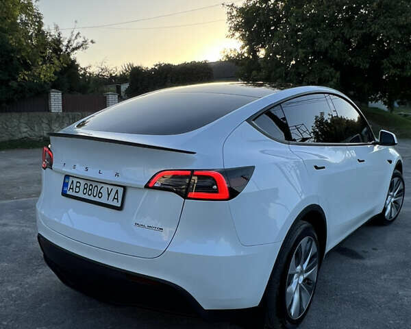 Білий Тесла Model Y, об'ємом двигуна 0 л та пробігом 81 тис. км за 31900 $, фото 20 на Automoto.ua