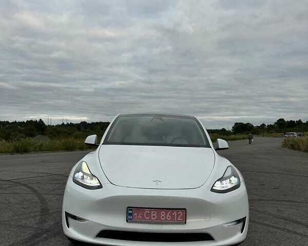 Білий Тесла Model Y, об'ємом двигуна 0 л та пробігом 20 тис. км за 26700 $, фото 1 на Automoto.ua