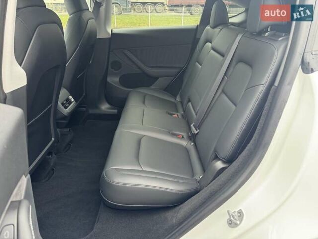 Белый Тесла Model Y, объемом двигателя 0 л и пробегом 59 тыс. км за 31490 $, фото 19 на Automoto.ua