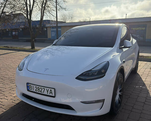 Белый Тесла Model Y, объемом двигателя 0 л и пробегом 29 тыс. км за 29500 $, фото 1 на Automoto.ua
