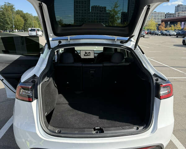 Тесла Model Y 2023 в Киеве на Automoto.ua Белый Тесла Model Y, объемом двигателя 0 л и пробегом 70 тыс. км за 31000 $, фото 20 на Automoto.ua