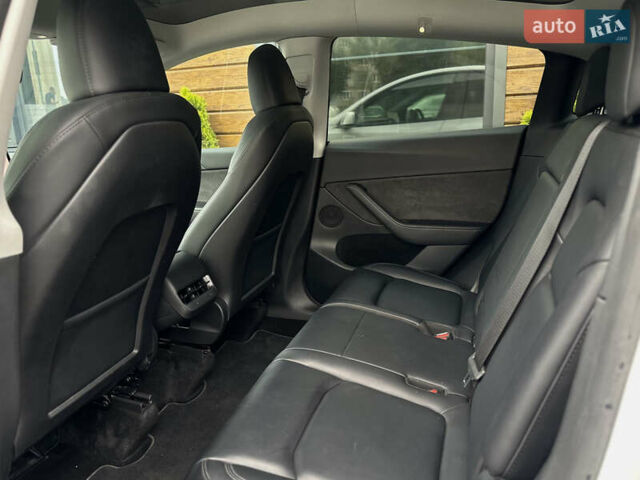Білий Тесла Model Y, об'ємом двигуна 0 л та пробігом 47 тис. км за 27600 $, фото 54 на Automoto.ua