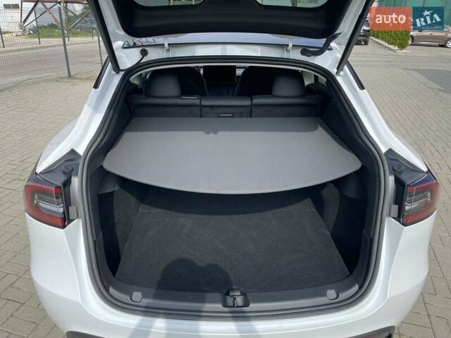 Білий Тесла Model Y, об'ємом двигуна 0 л та пробігом 25 тис. км за 28500 $, фото 11 на Automoto.ua