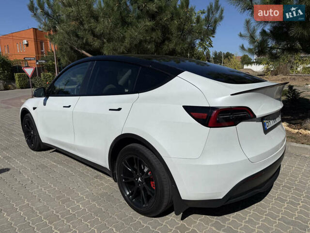 Белый Тесла Model Y, объемом двигателя 0 л и пробегом 59 тыс. км за 32000 $, фото 3 на Automoto.ua