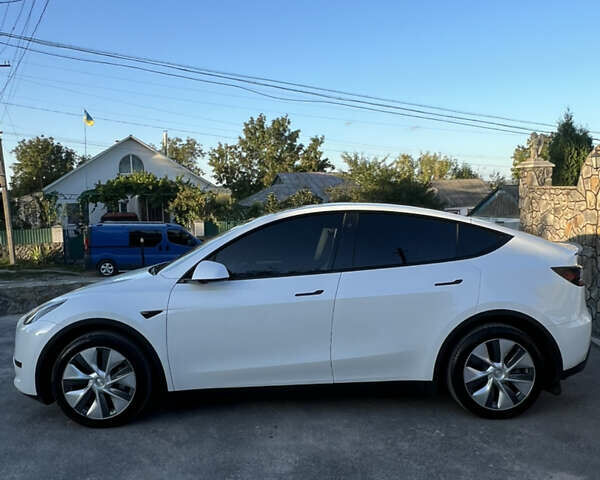 Білий Тесла Model Y, об'ємом двигуна 0 л та пробігом 81 тис. км за 31900 $, фото 3 на Automoto.ua