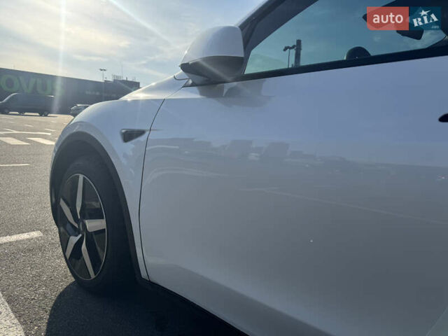 Белый Тесла Model Y, объемом двигателя 0 л и пробегом 76 тыс. км за 33000 $, фото 5 на Automoto.ua