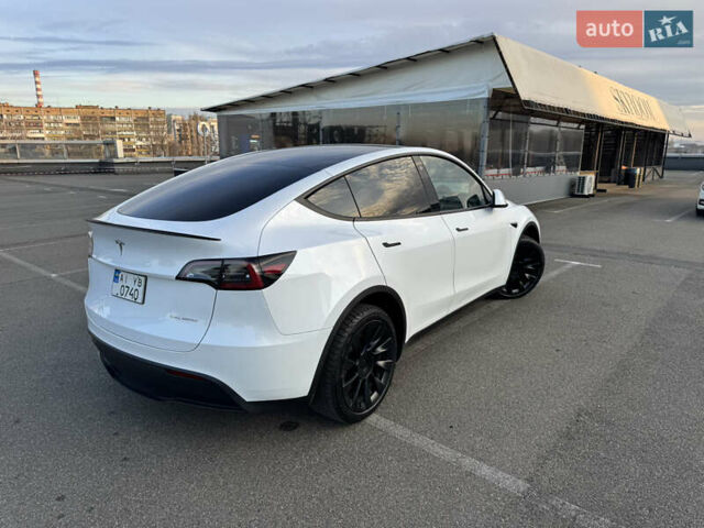 Белый Тесла Model Y, объемом двигателя 0 л и пробегом 24 тыс. км за 28999 $, фото 2 на Automoto.ua